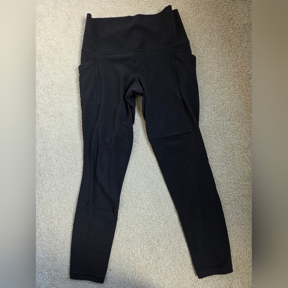 Athleta Black Salutation Stash Tipped Tight Leggings